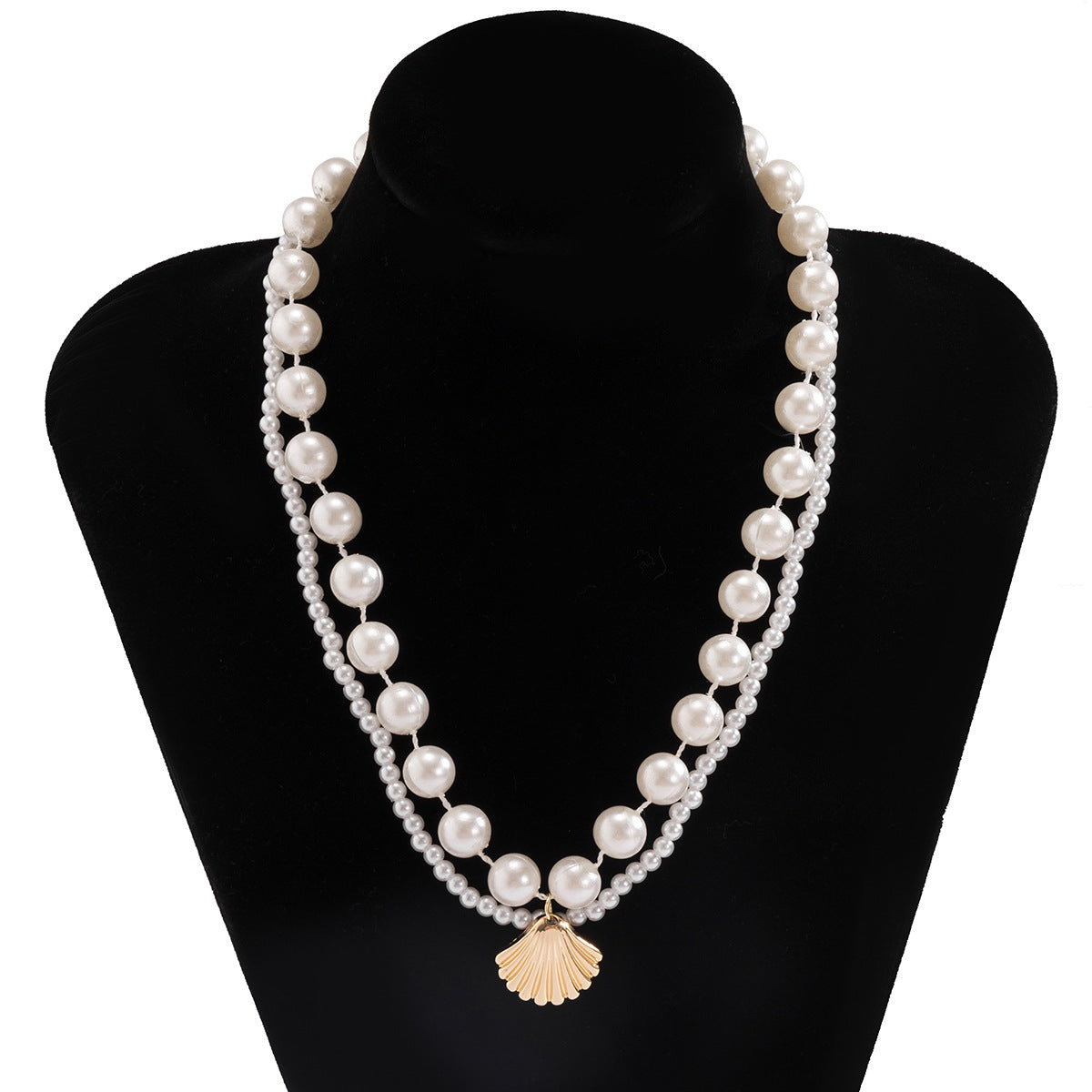 Elegante collar de varias capas inspirado en el océano con concha geométrica y detalles de perlas de imitación para mujer