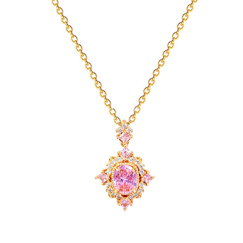 Collana con ciondolo a rombo rosa in stile cartone animato in acciaio al titanio con intarsio completo di strass per donne e uomini