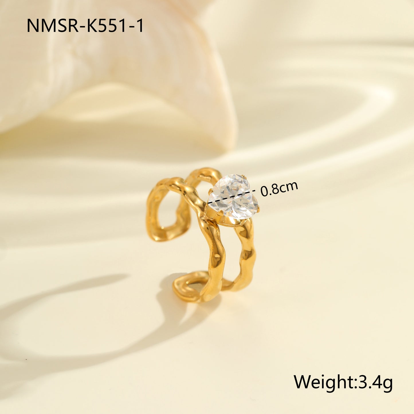 Anello minimalista irregolare geometrico in acciaio al titanio con intarsio di zirconi e placcatura in oro 18 carati per donna