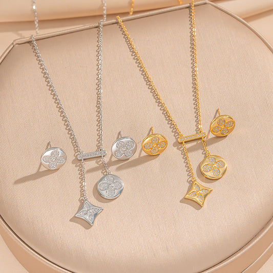 Luxury Minimalist Four-Leaf Clover Pendant Necklace with Tassels and Geometric Accents in Titanium Steel with 18K Gold Plating for Women