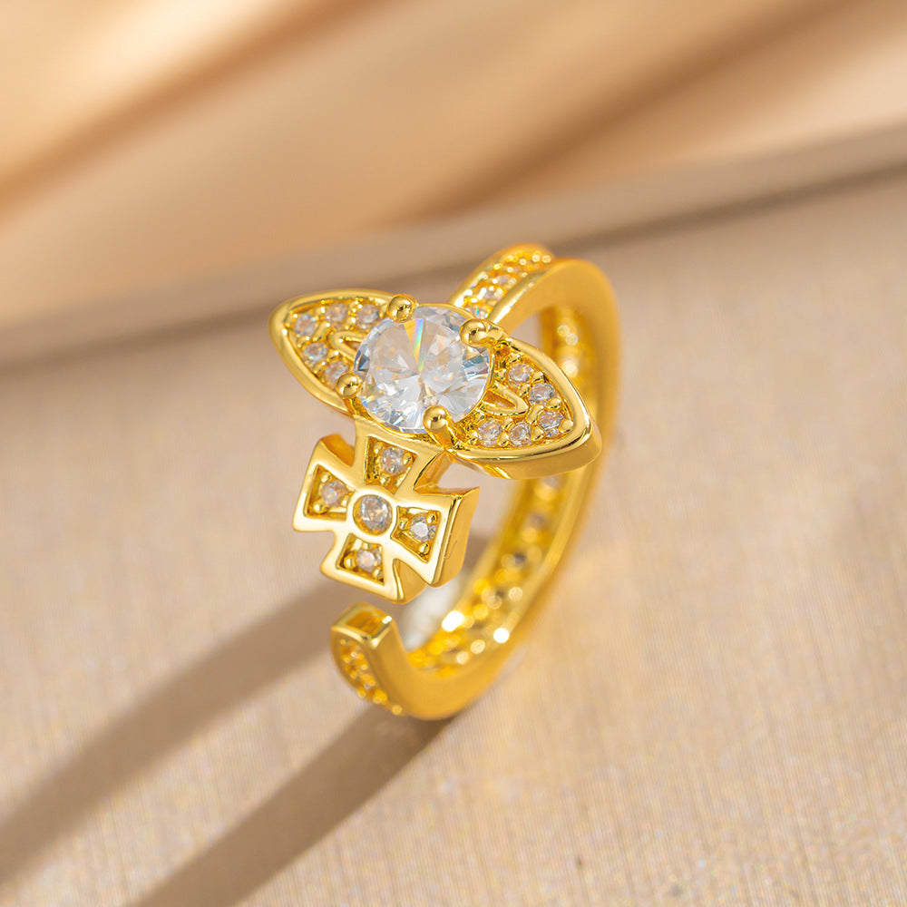 Anello lusso da donna regolabile a forma di Saturno con zirconi incastonati, in rame placcato oro e design geometrico minimalista