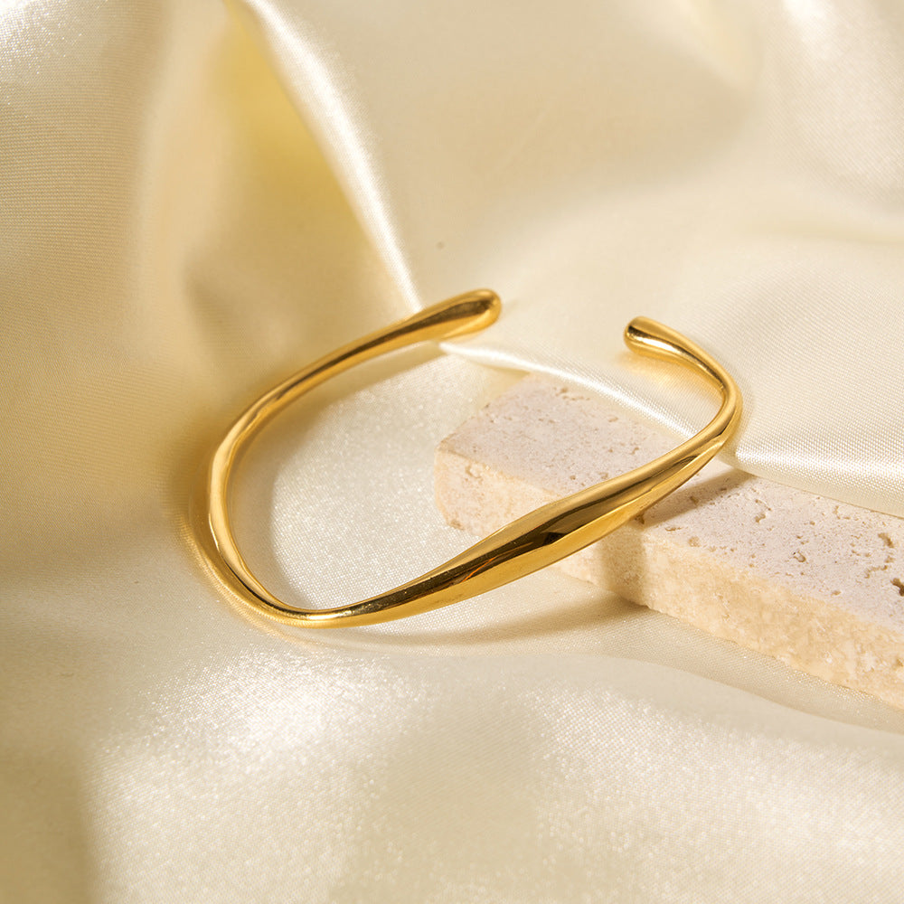 Bracciale rigido aperto geometrico minimalista da donna in acciaio inossidabile placcato oro