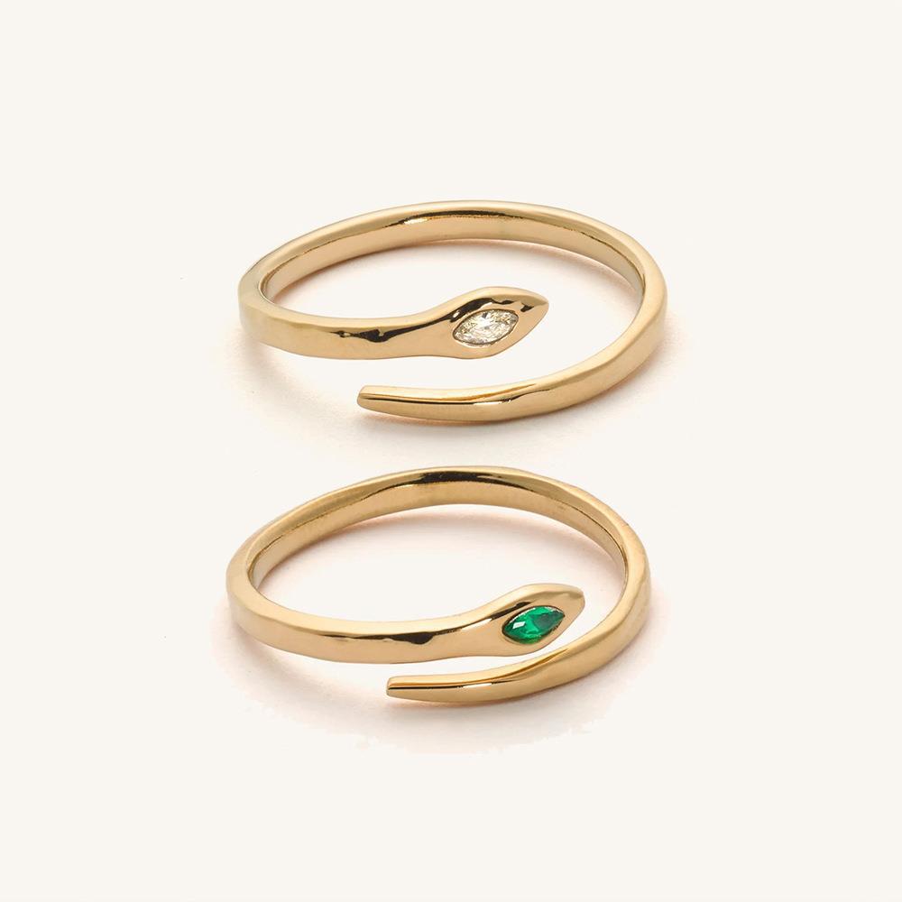 Anello da donna minimalista di lusso a forma di serpente in acciaio inossidabile con intarsio di zirconi e finitura placcata in oro