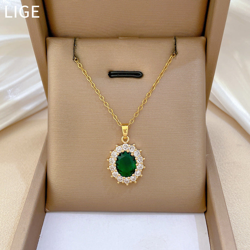 Collar de acero de titanio para mujer con gema verde en forma de huevo estilo caricatura, incrustaciones de diamantes de imitación y delicada cadena para la clavícula