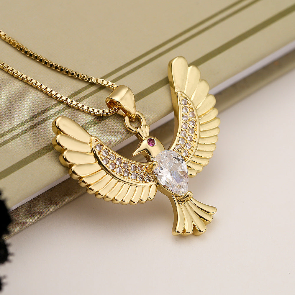 Collana con ciondolo a forma di uccello minimalista in rame placcato oro con zirconi per donna