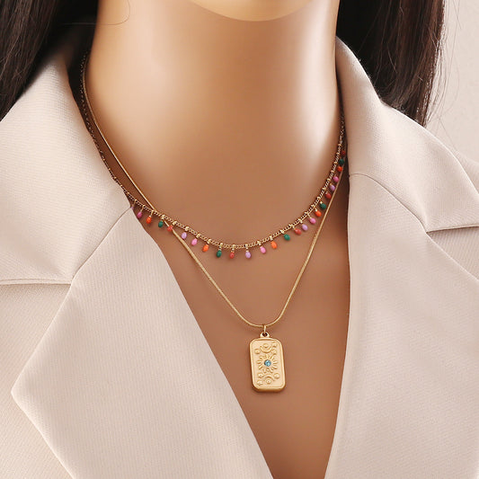 Elegante collar de cadena en O de doble capa de acero inoxidable con colgante de gota esmaltado para mujer