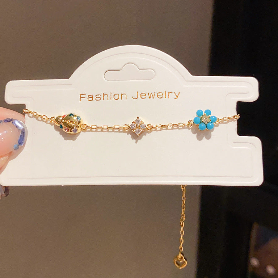 Sweet Minimalist 18K Gold Plated Brass Floral Cubic Zirconia Bracelet for Women