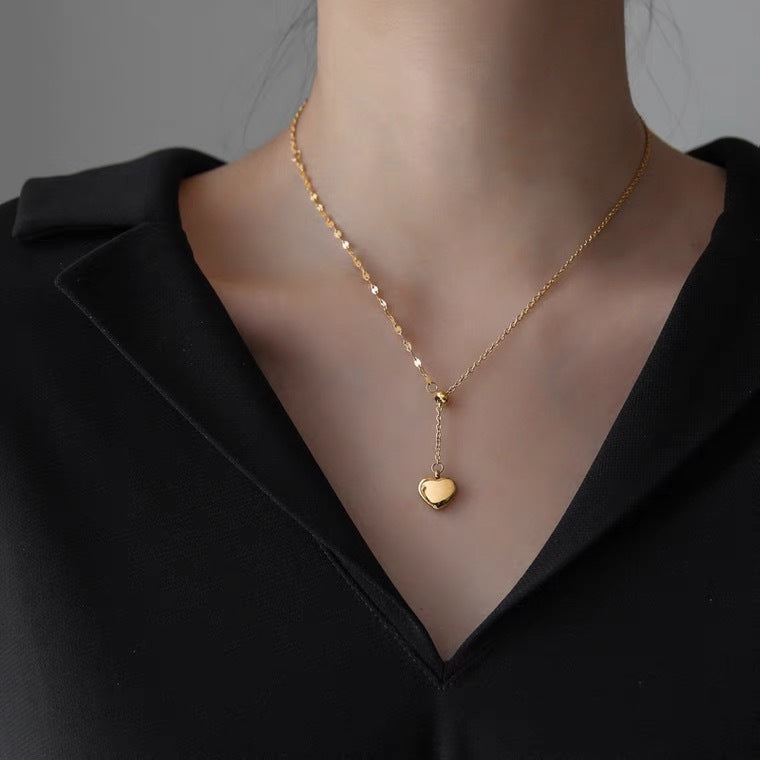 Minimalist Heart-Shaped Titanium Steel Pendant Necklace with Tassel and Adjustable Drawstring for Women