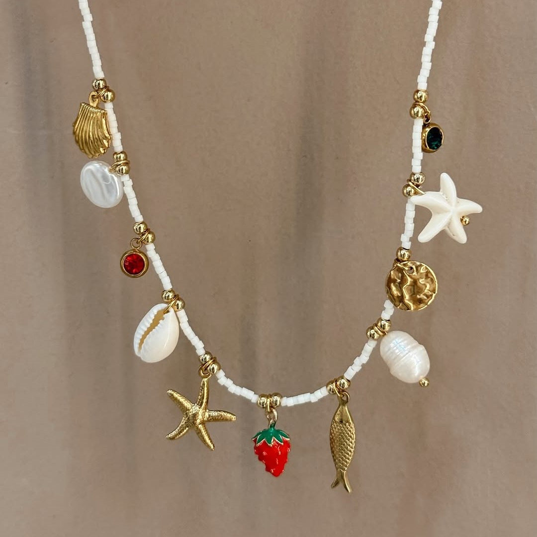 Bohemian Beach Shell Necklace with Starfish and Conch Pendant in Stainless Steel with Plated Finish