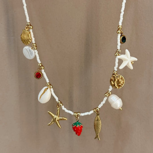 Collar bohemio de conchas para playa con colgante de estrella de mar y caracola en acero inoxidable con acabado chapado