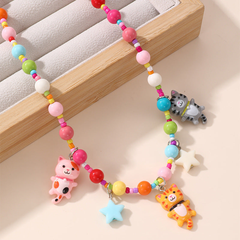 Collana con ciondolo a fiocco dolce pastello per ragazze con ciondolo in resina su catena a O, gioielli in stile cartone animato