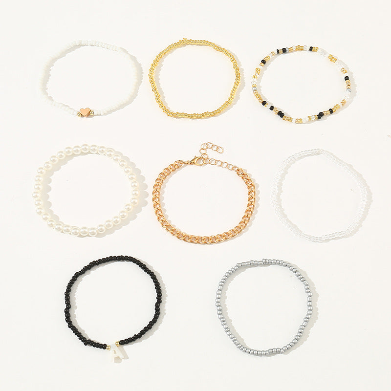Set di Braccialetti con Lettere in Perle di Vetro a Cuore Minimalista per Bambini con Perle in Resina e Lavorazione Artigianale