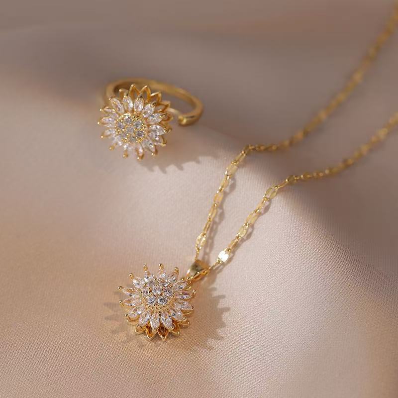 Minimalist Sunflower Pendant Necklace for Women with Rotating Daisy Design, Titanium Steel Snake Chain, Rhinestone Inlay, Geometric Shape