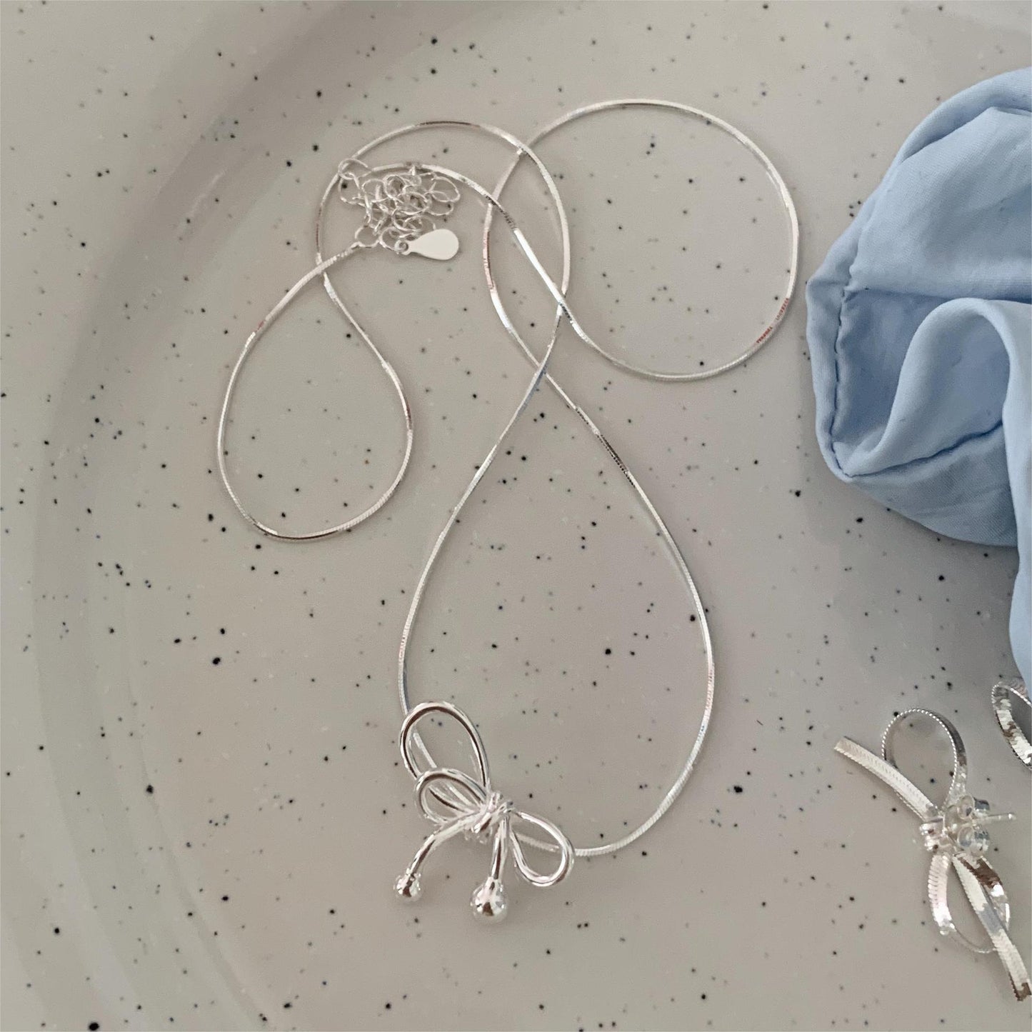 Sweet Minimalist Bow Knot Necklace in 925 Sterling Silver with Geometric Accent