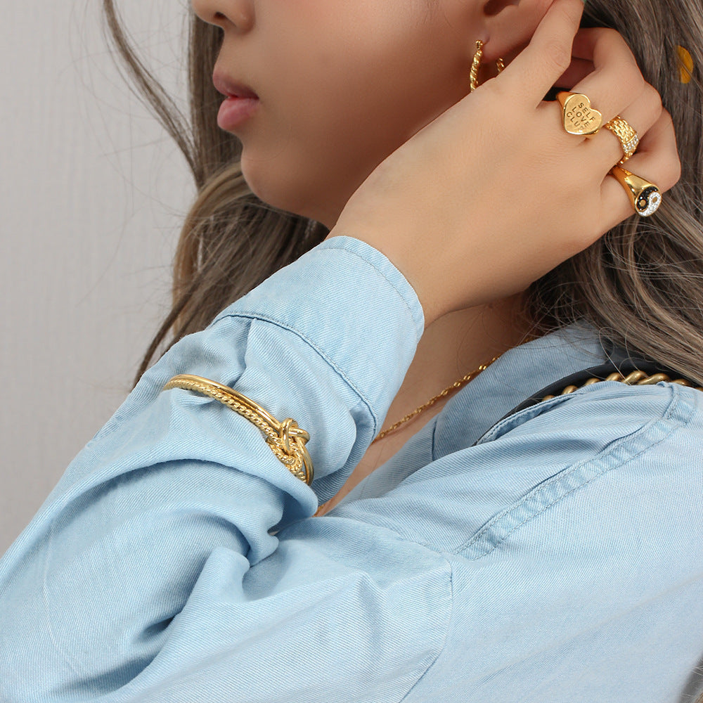 Minimalist Twist Knot Stainless Steel Bracelet for Women with Plated Finish