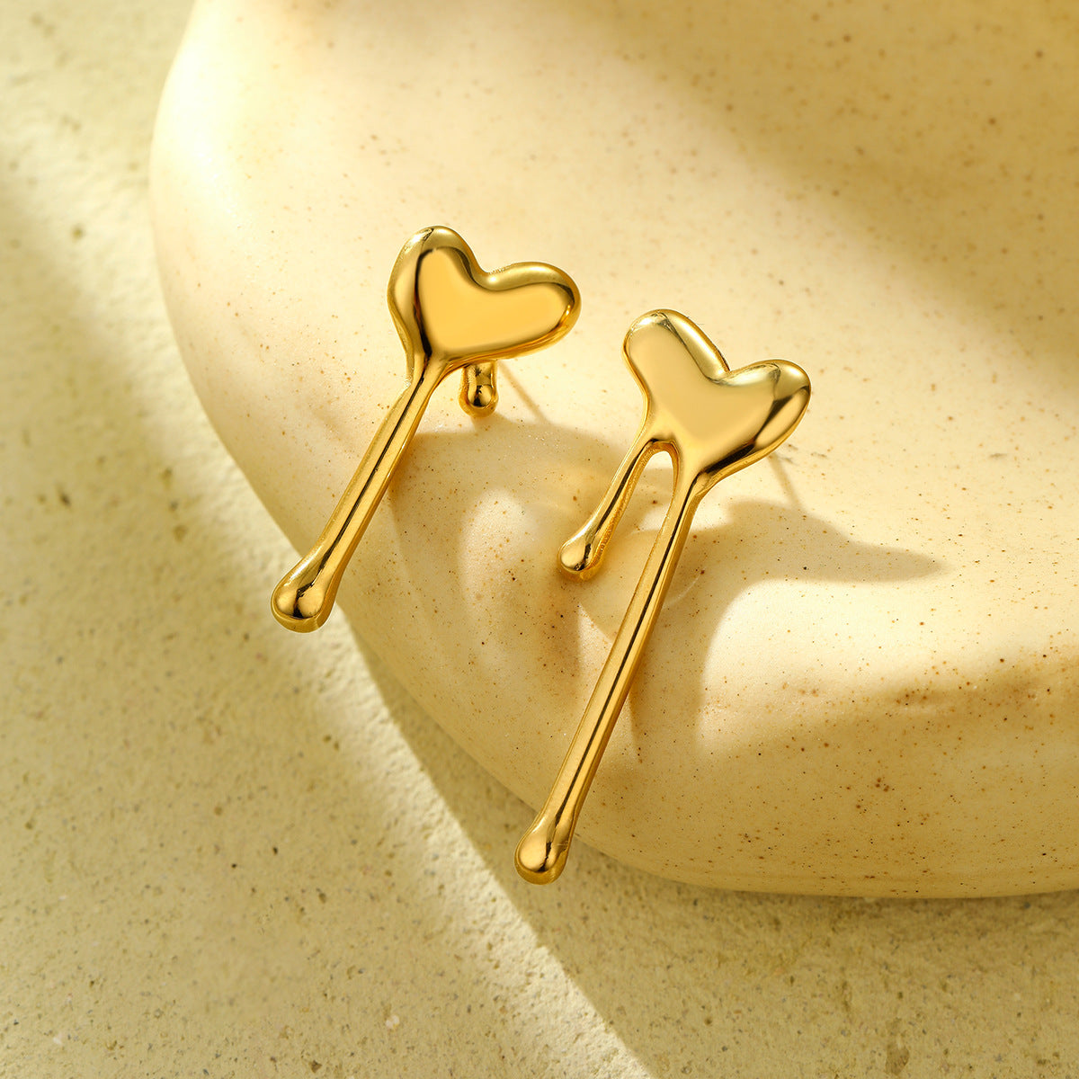 Fashionable Minimalist Lava Heart-Shaped Titanium Steel Earrings for Women with Dangling Teardrop and Tassel Details