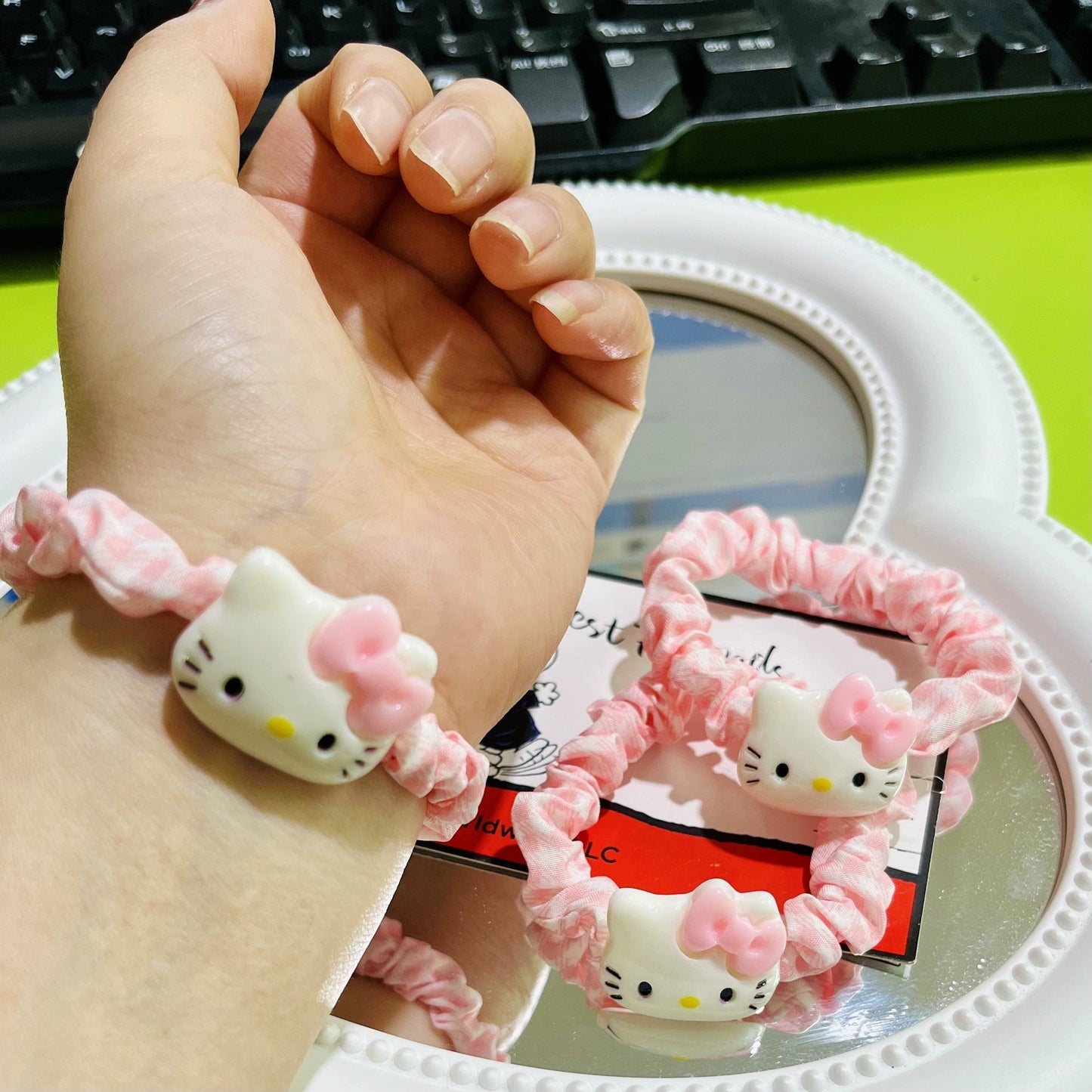 Set di elastici per capelli Hello Kitty carini con fiocco rosa e accenti color macaron per bambine, accessori per capelli in tessuto a maglia