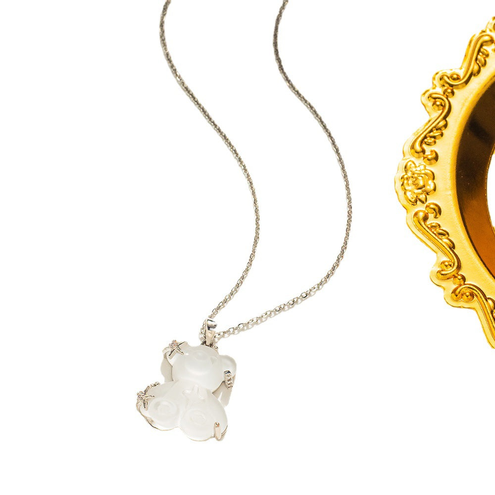 Collana pendente minimalista orsetto e stella da donna in acciaio al titanio placcato oro con catena a maglie ovali