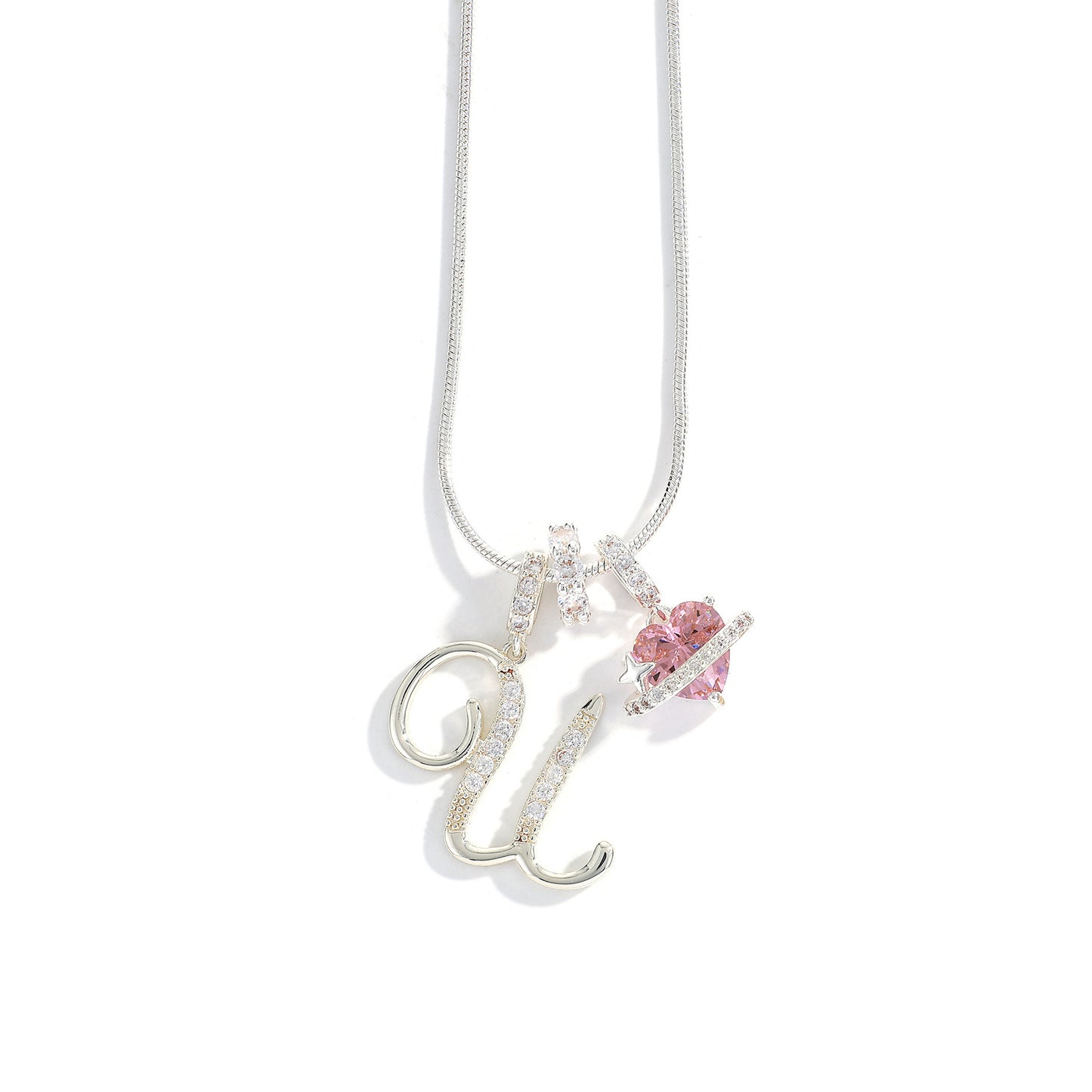 Collana con ciondolo a lettera minimalista in rame con intarsio di zirconi dal design geometrico per donna