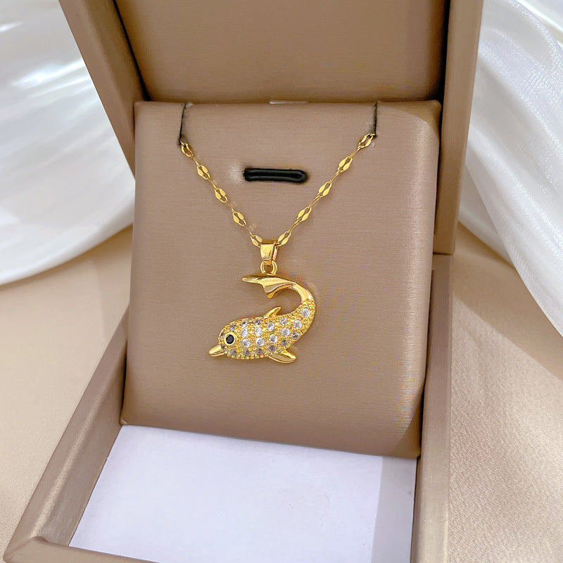 Collana con ciondolo a delfino minimalista per donne e uomini in acciaio al titanio con intarsio di strass su catena a serpente