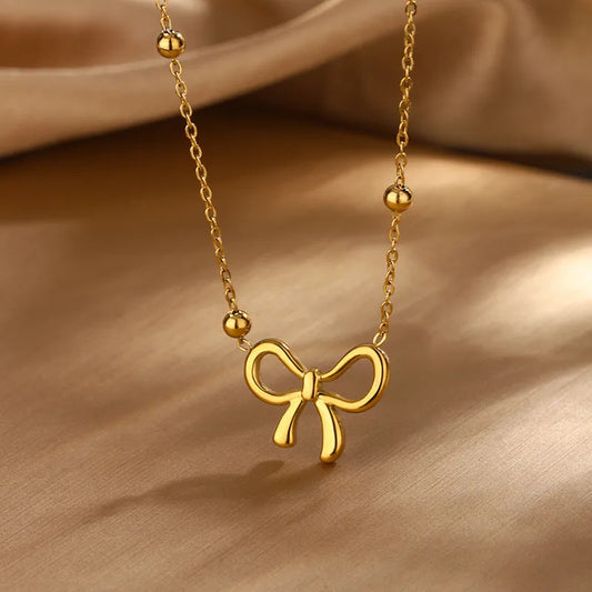 Elegante Parure di Collana e Orecchini con Fiocco in Acciaio Inossidabile Placcato Oro 18K da Donna