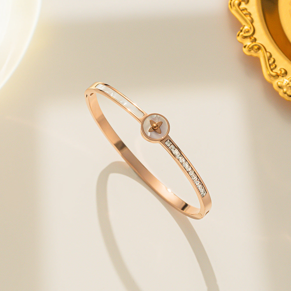Minimalist Gold-Plated Titanium Steel Bracelet for Women with Rhinestone-Inlaid Shell and Letter Charm