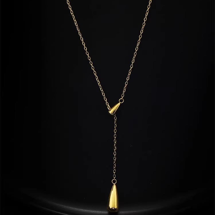Collana minimalista con goccia d'acqua tonalità fredda da donna in acciaio al titanio placcato, delicata catena a clavicola con design irregolare