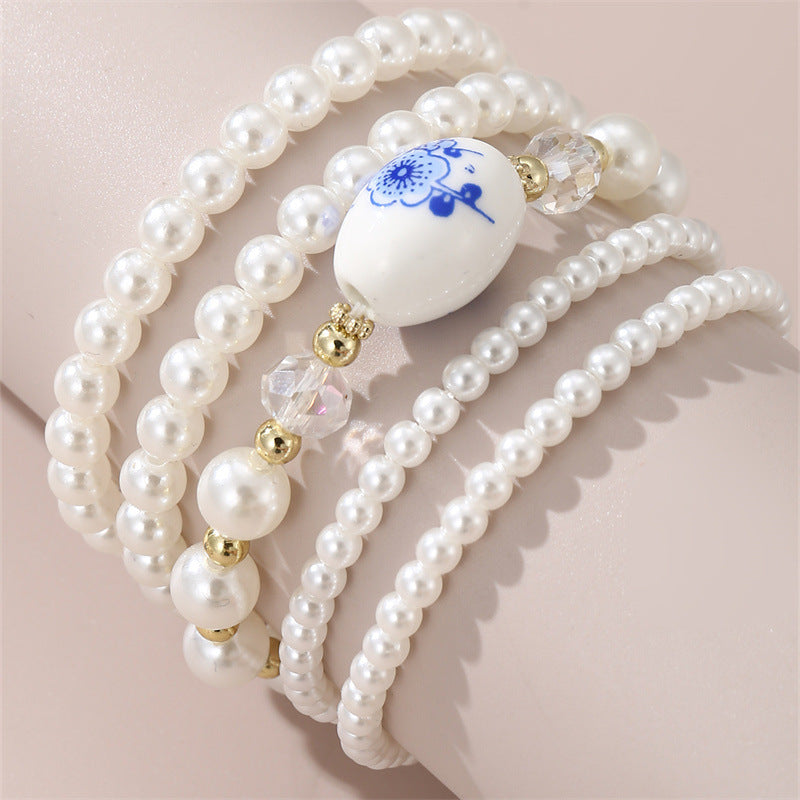 Conjunto de pulseras minimalistas florales vintage francesas para niñas hechas a mano con perlas de imitación y cuentas de cerámica, regalo elegante para cumpleaños o recuerdo de viaje