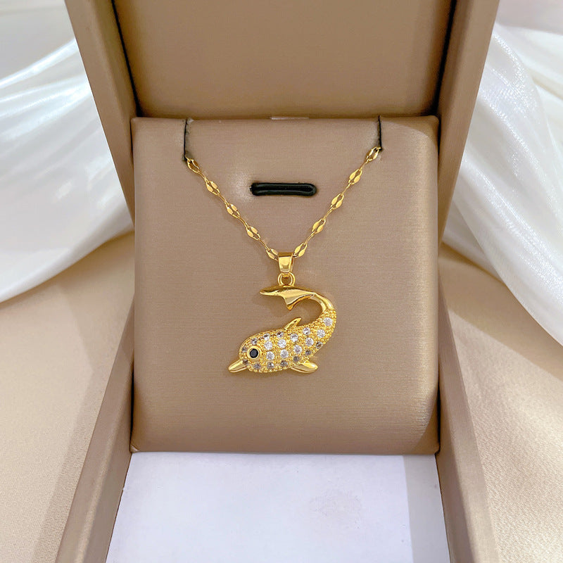 Collana con ciondolo a delfino minimalista per donne e uomini in acciaio al titanio con intarsio di strass su catena a serpente