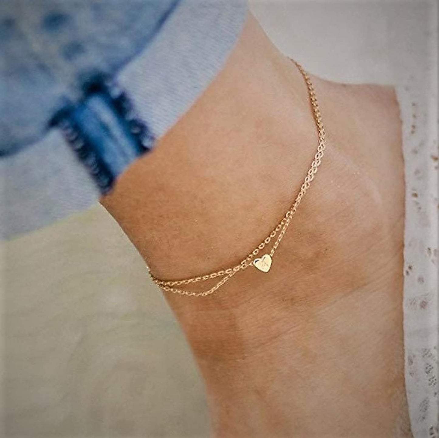 Cavigliera da Donna Minimalista in Acciaio al Titanio a Cuore Geometrico Placcata Oro 18K