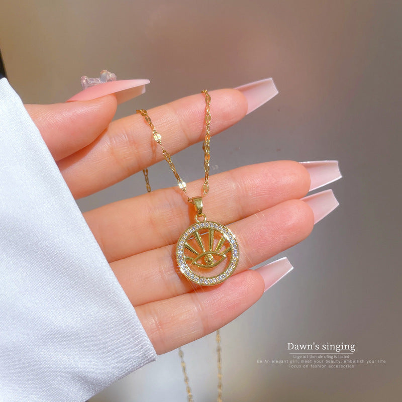 Collana Minimalista Geometrica in Acciaio al Titanio con Ciondolo Occhio di Allah in Zirconia Micro-Incastonata e Dettaglio in Rame Placcato Oro