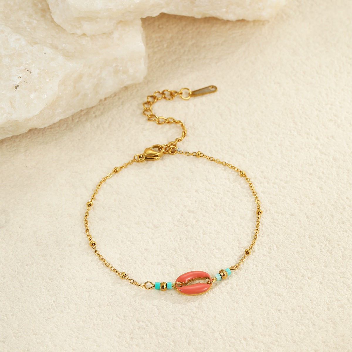 Bracciale da donna in acciaio inossidabile minimalista con perline ispirato all'oceano con conchiglie, stelle marine e dettagli floreali