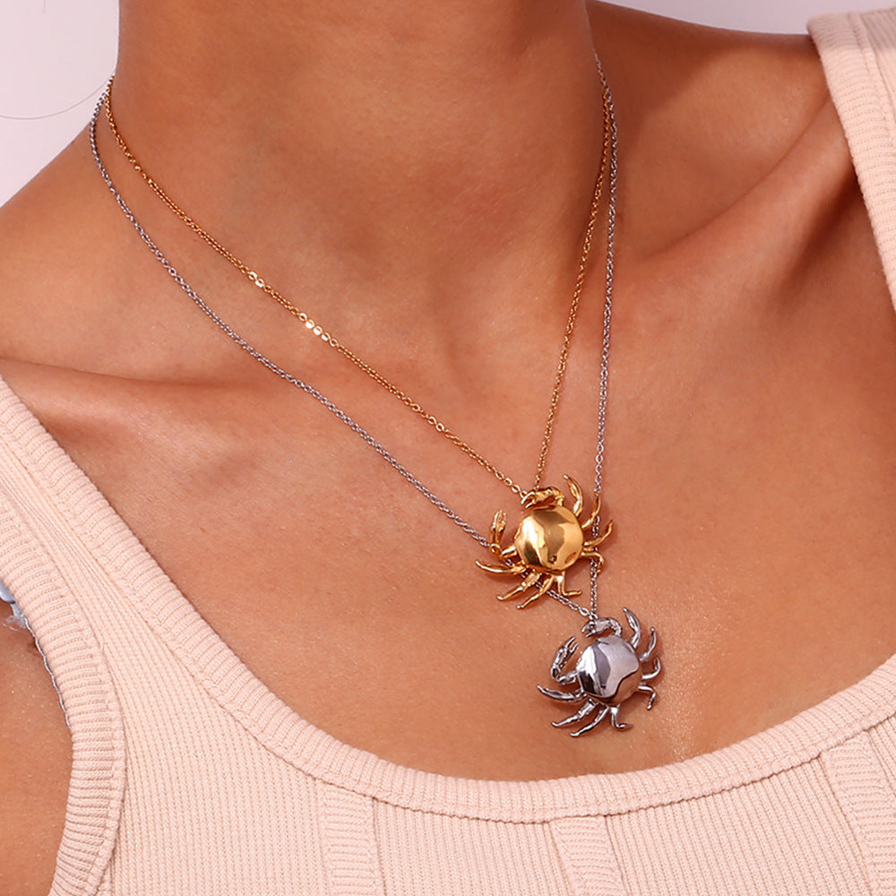 Elegante collar con colgante de cangrejo para mujer en acero inoxidable con baño de oro de 18 quilates