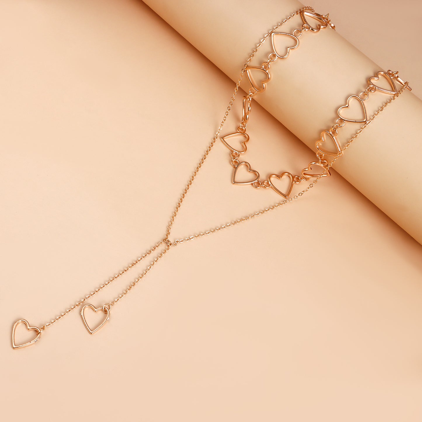 Minimalist Hollow Heart Pendant Necklace in Alloy with Plated Finish Long Layered Sweater Chain for Women