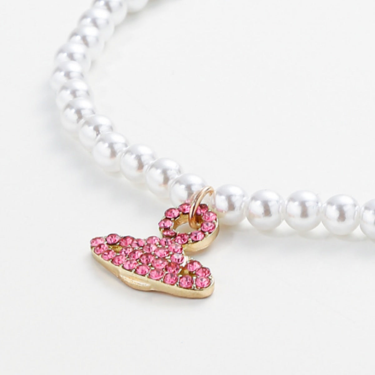 Collana con ciondolo di Saturno minimalista da donna con intarsi in strass su catena in lega nelle forme geometriche di corona e stella