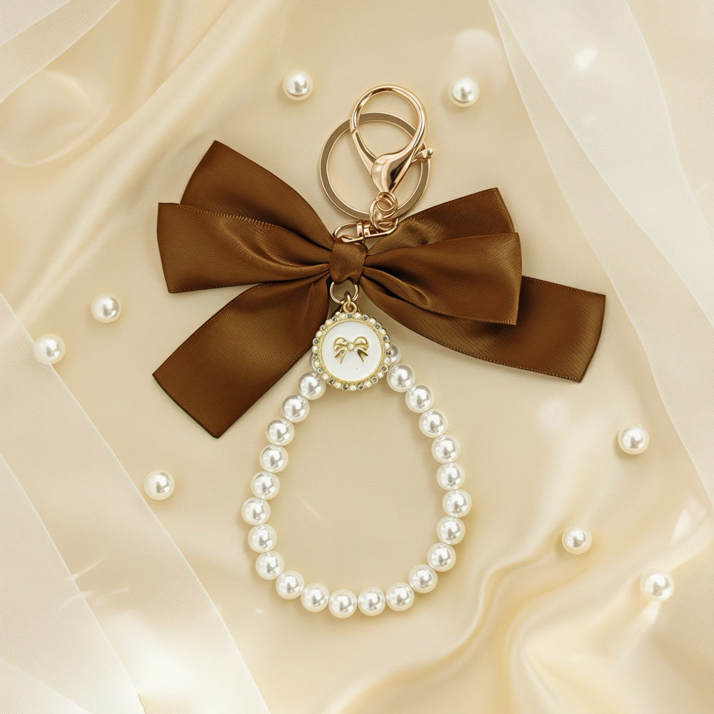 Sweet Cartoon Bow Pearl Zinc Alloy Keychain Bag Charm