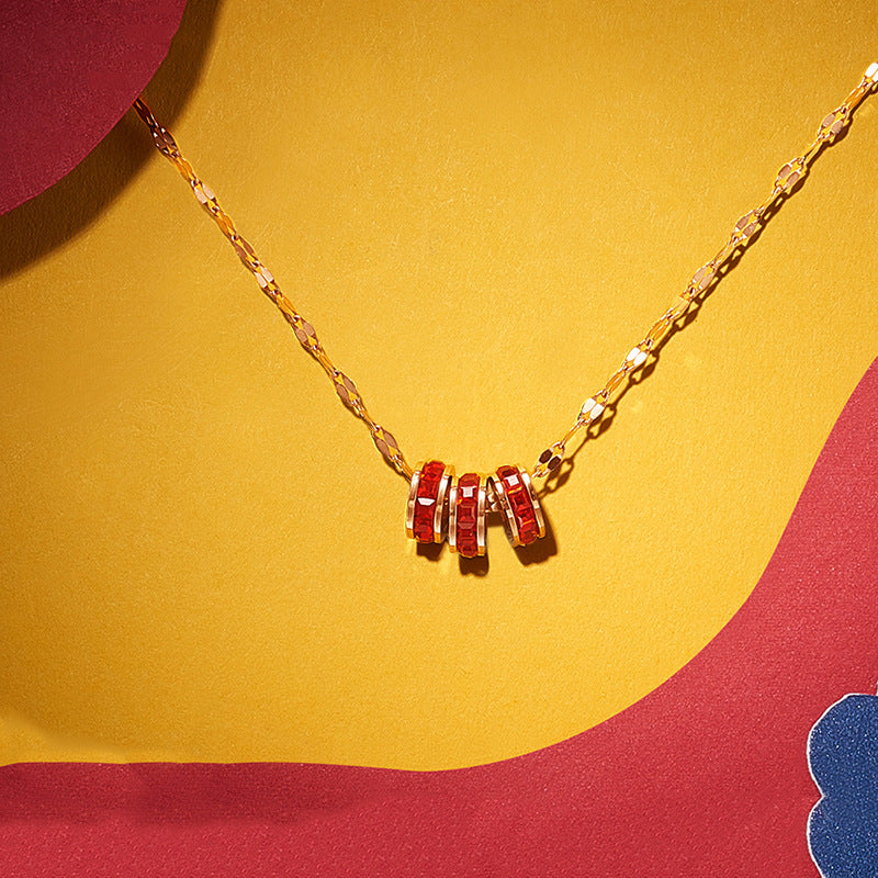 Collana Minimalista Geometrica in Acciaio Titanio con Tre Strass Verdi da Donna