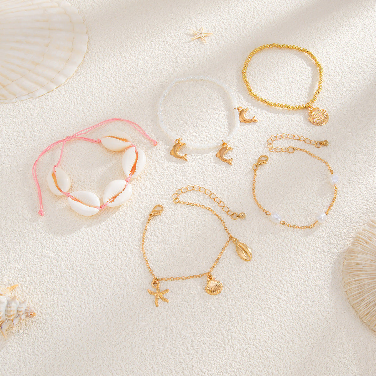 Bracciale in lega stile bohémien con stelle e forme geometriche, ciondoli a delfino e stella per donna, gioielli estivi da spiaggia galvanizzati