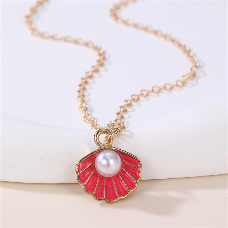 Dulce Collar con Colgante de Mariposa y Lazo Fresco para Niñas con Dije de Concha con Perlas de Aleación y Acabado Esmaltado Artesanal