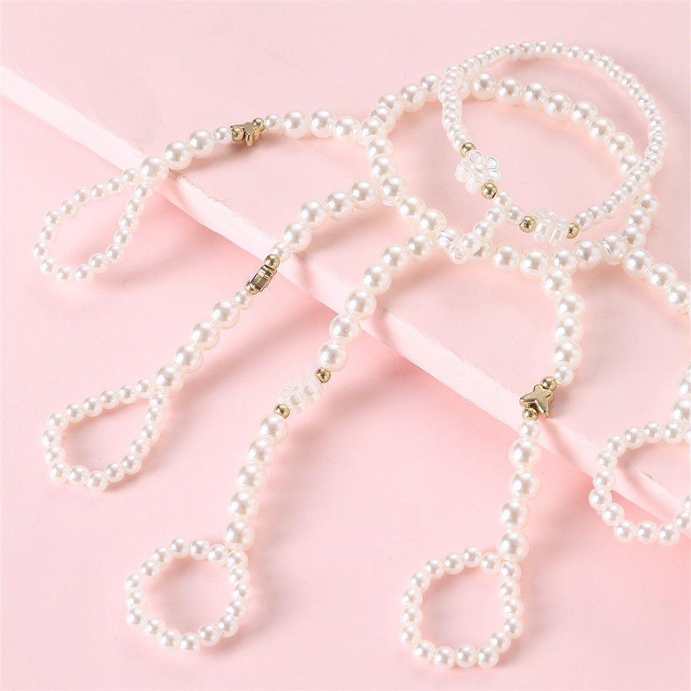 Pulsera Dulce Floral con Perlas para Niñas con Dijes de Flores de Resina y Delicados Acentos de Estrellas