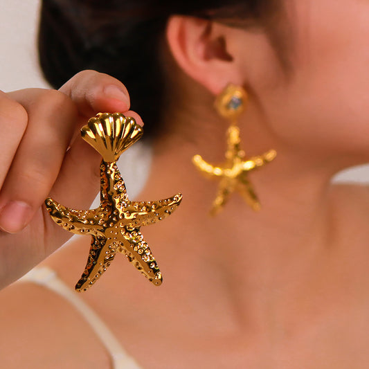 Pendientes minimalistas para mujer de acero inoxidable chapados en oro, con diseño de estrella y concha asimétrica, inspirados en el océano
