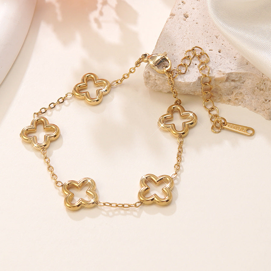 Elegante Bracciale Minimalista da Donna in Acciaio Inossidabile Placcato Oro con Zirconi e Quadrifoglio