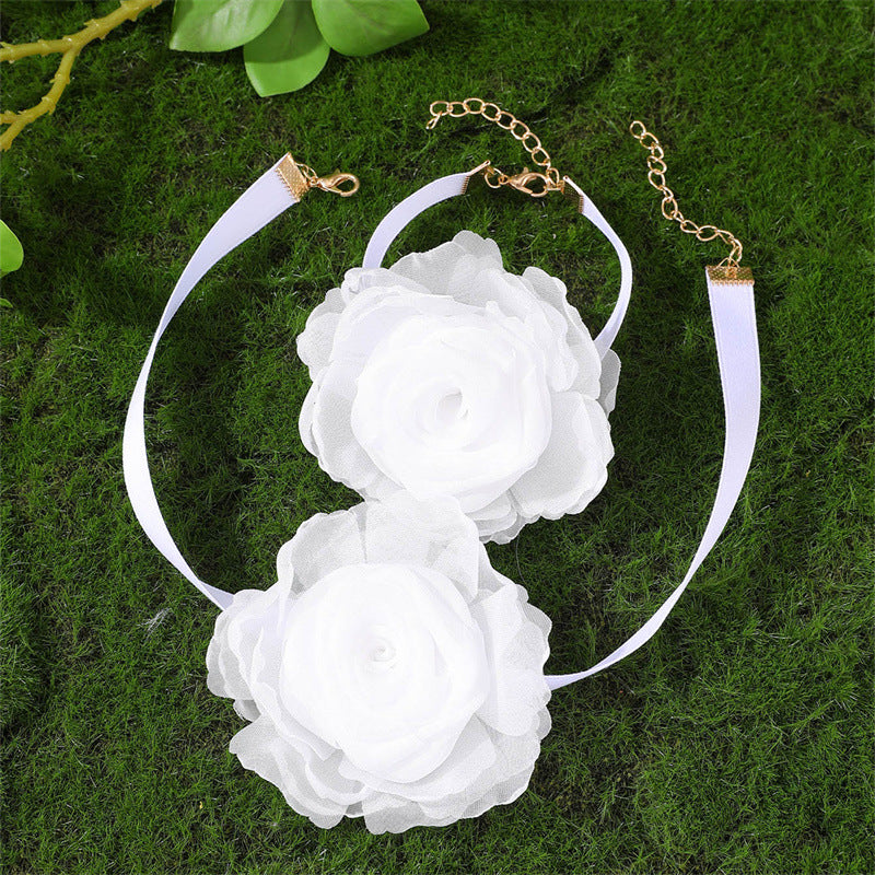 Set coordinato collana e bracciale floreale fatti a mano da donna con design a fiocco in tessuto e lega, stile fresco e dolce