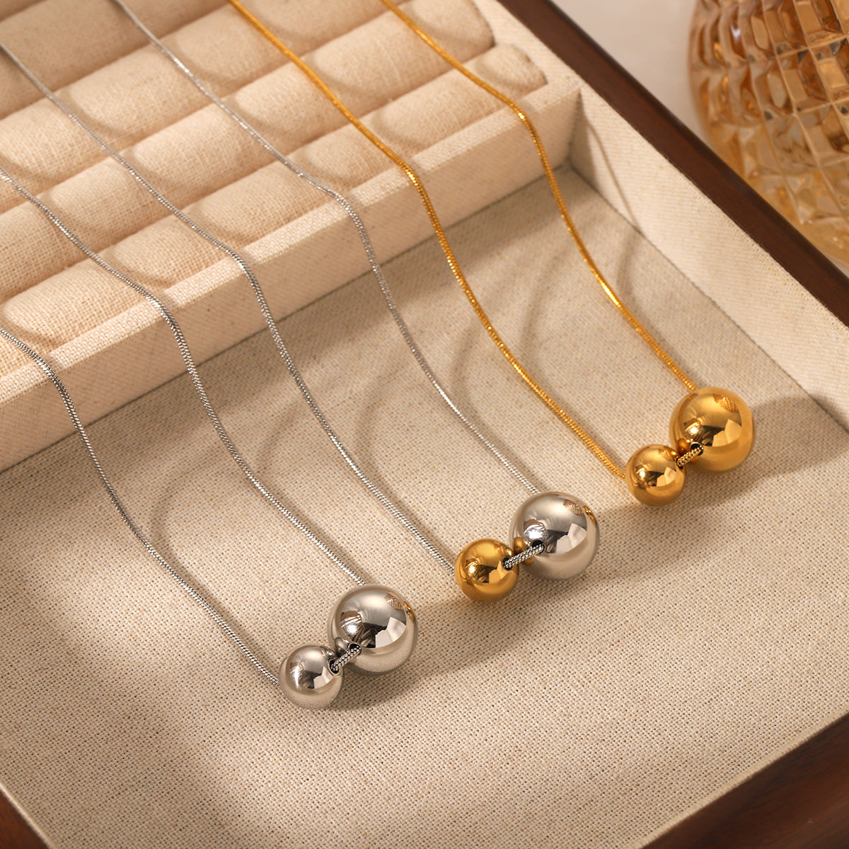 Minimalist Geometric Ball Pendant Necklace in Stainless Steel with Gold and Silver Plated Titanium Steel Accents Snake Chain Collar Jewelry for Women