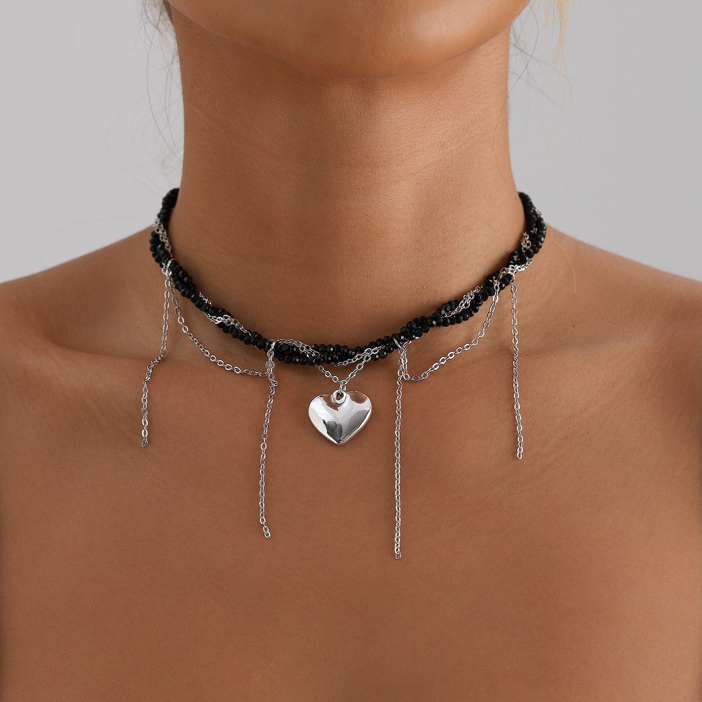 Fashionable Heart-Shaped Alloy Pendant Necklace with Plated Finish, Layered Long Locket Chain and Delicate Tassel Detail for Women