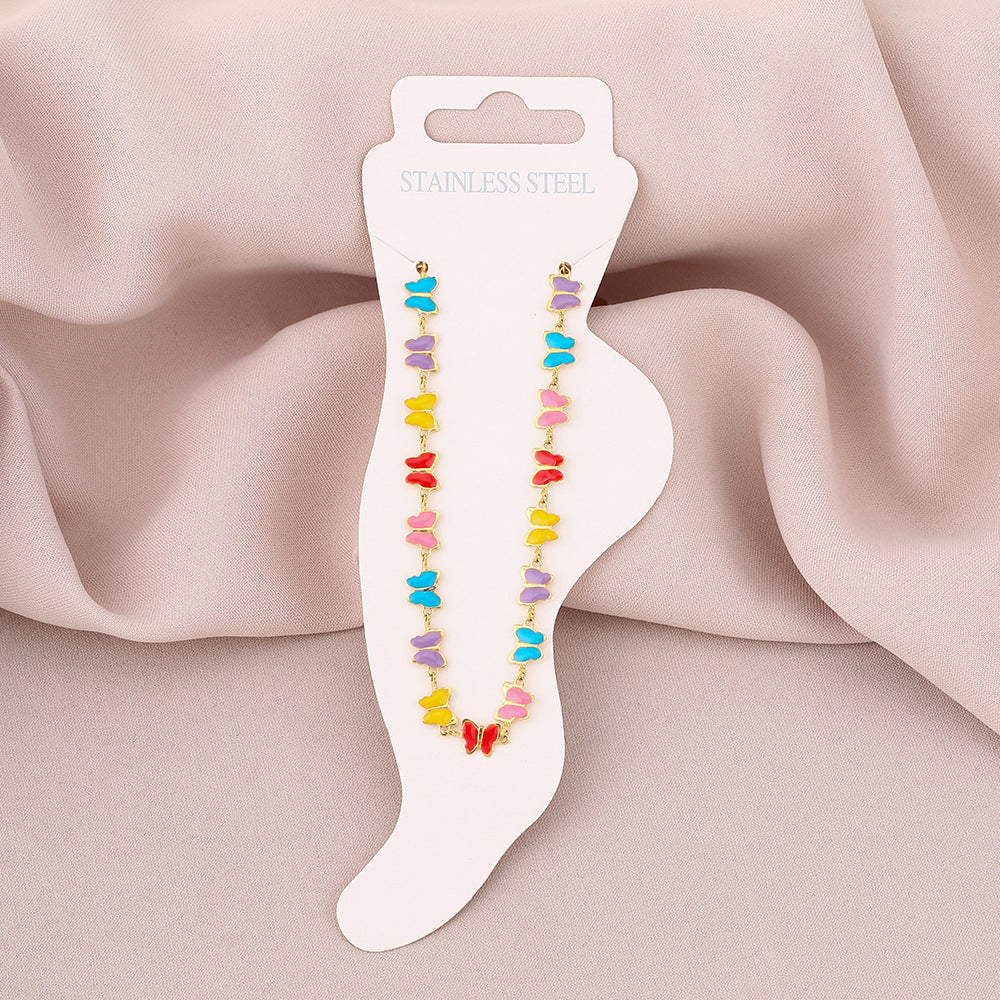 Elegante cavigliera da donna in acciaio al titanio a forma di farfalla con smalto, accessorio di moda dal design geometrico