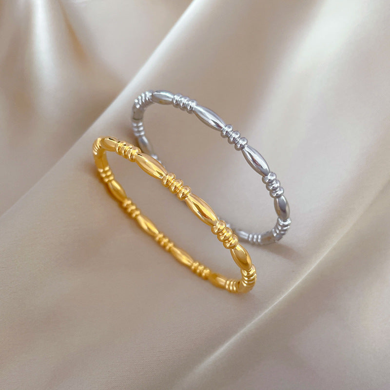 Pulsera Zen Minimalista de Acero de Titanio con Acabado Chapado para Mujer y Hombre