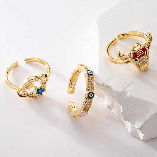 Geometric Open-Ended Ring for Women with Copper Base Plated in Real Gold and Micro-Paved Zirconia Bull Head and Planet Design