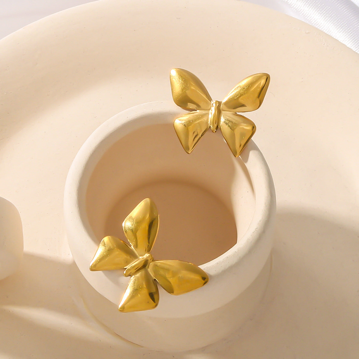 Minimalist Bowknot Titanium Steel Earrings with 18K Vacuum Plating for Women