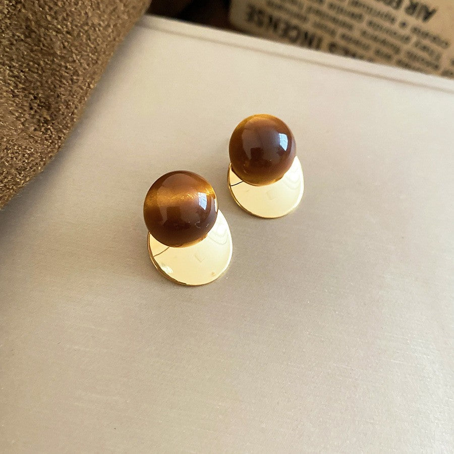 Pendientes de botón de acero chapado de estilo lujoso con perlas de imitación y detalles de ojo de tigre con diseño floral para mujer